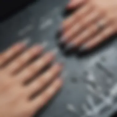 A collection of press-on nails displayed with application tools