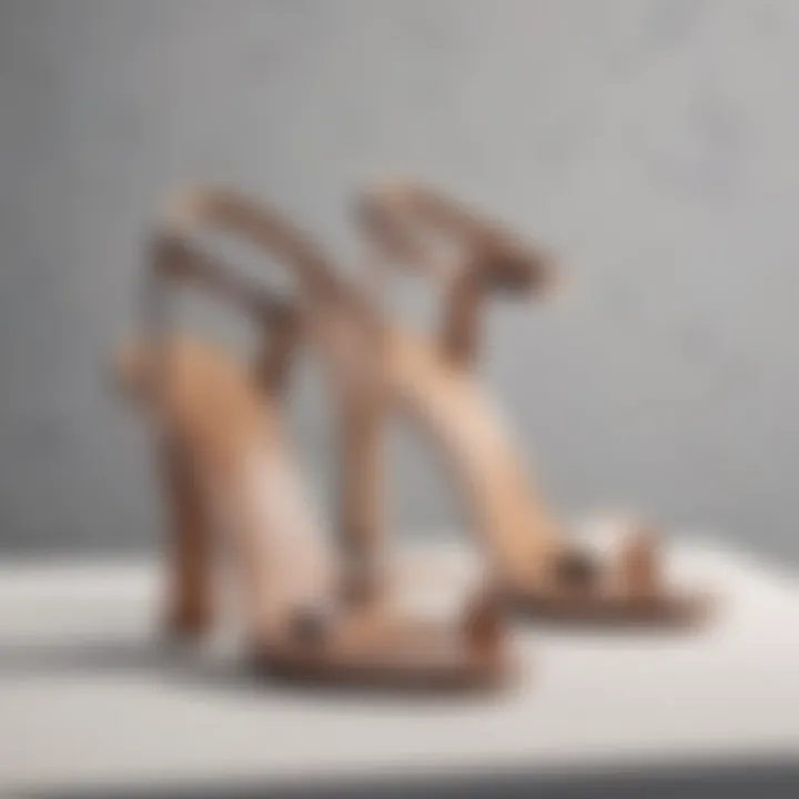 Elegant low chunky heel sandals displayed on a sophisticated backdrop.