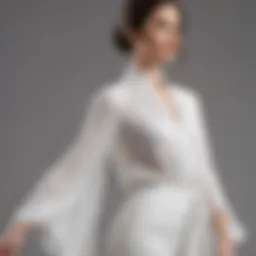 Elegant white bell sleeve blouse draped on a mannequin, showcasing its flowing design